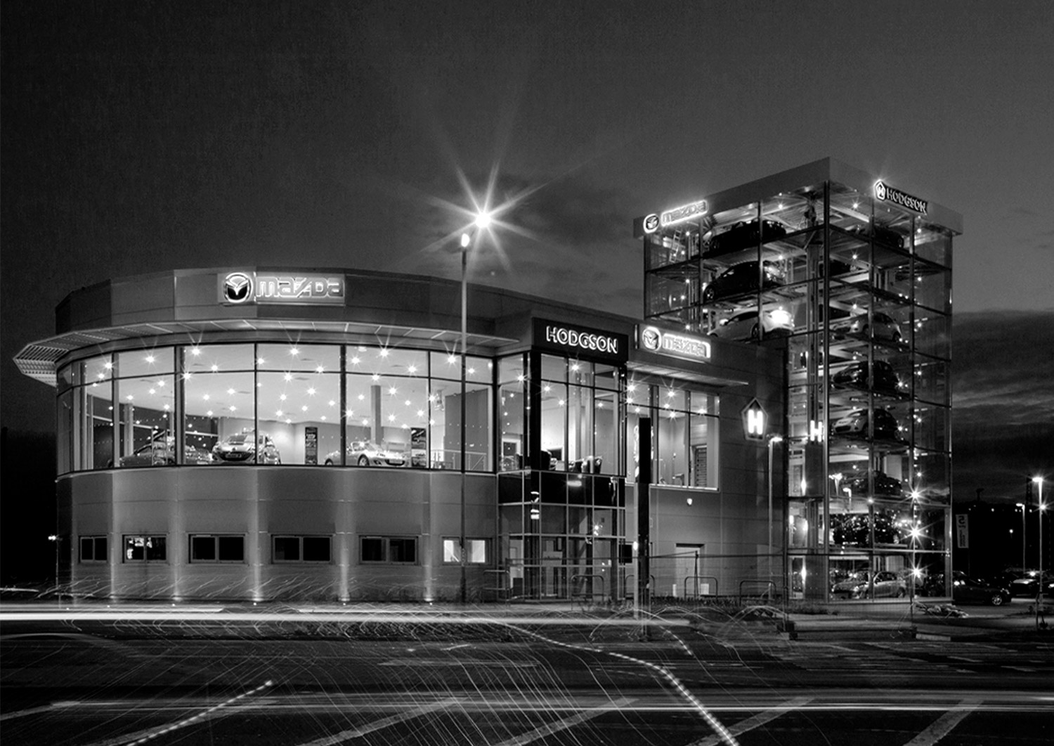 Photograph of a commercial car showroom. Bespoke design. Architect. Design Led Architecture. Newcastle. Durham. North East.